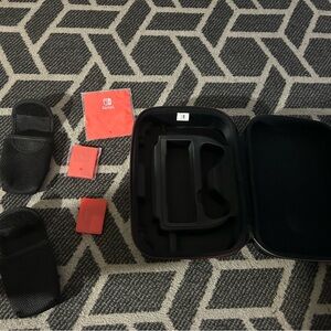 Nintendo switch suitcase/carrier (comes with game holders and game pouches)